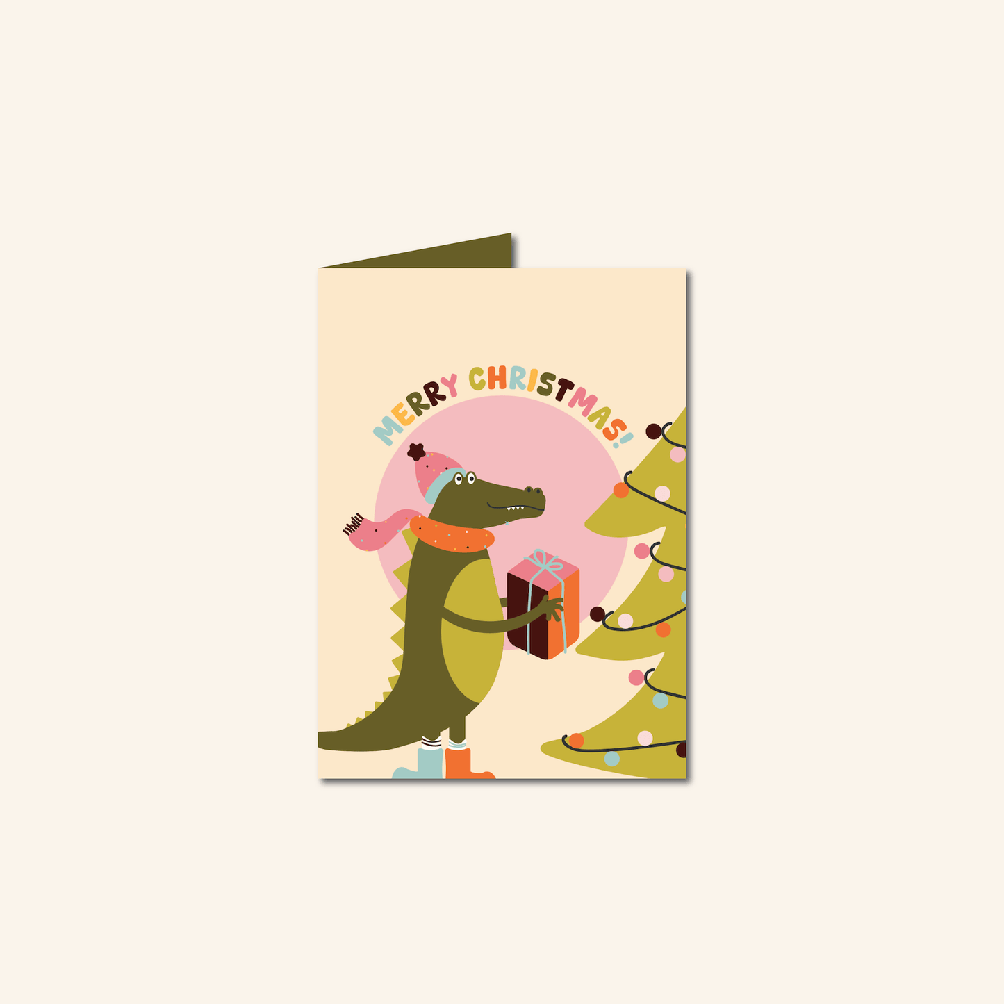 Set van 8 kerstkaarten van Studio Bloos met kleurrijke illustraties: panda met snoepstok en gewei, krokodil met cadeau, cactus als kerstboom en dansende aap in de sneeuw. Inclusief enveloppen.